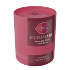 Pink cylindrical container of QoL Cleomark dark spot removal cream on a white background angled left